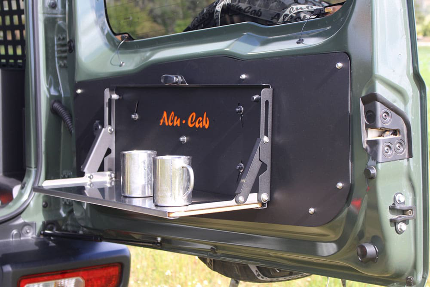 Alu-Cab Jimny Rear Door Drop Down Table fitted to Suzuki Jimny — Rival 4x4 Australia