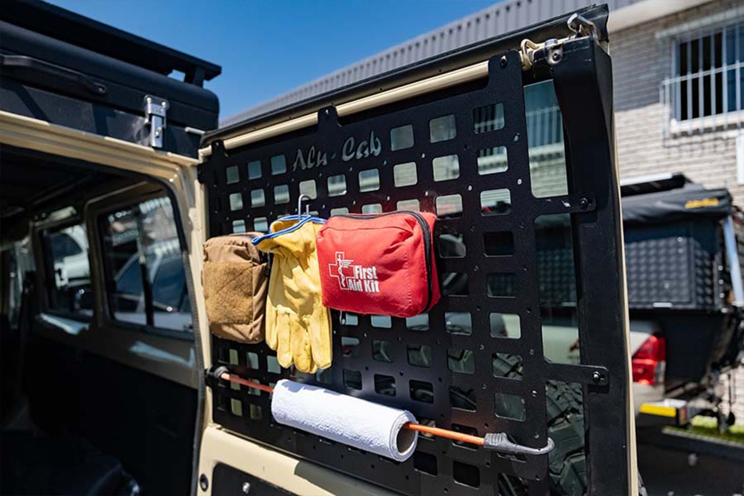 Alu-Cab Land Cruiser 78 Series Rear Door Molle Plates fitted to Toyota Land Cruiser 70 Series — Rival 4x4 Australia