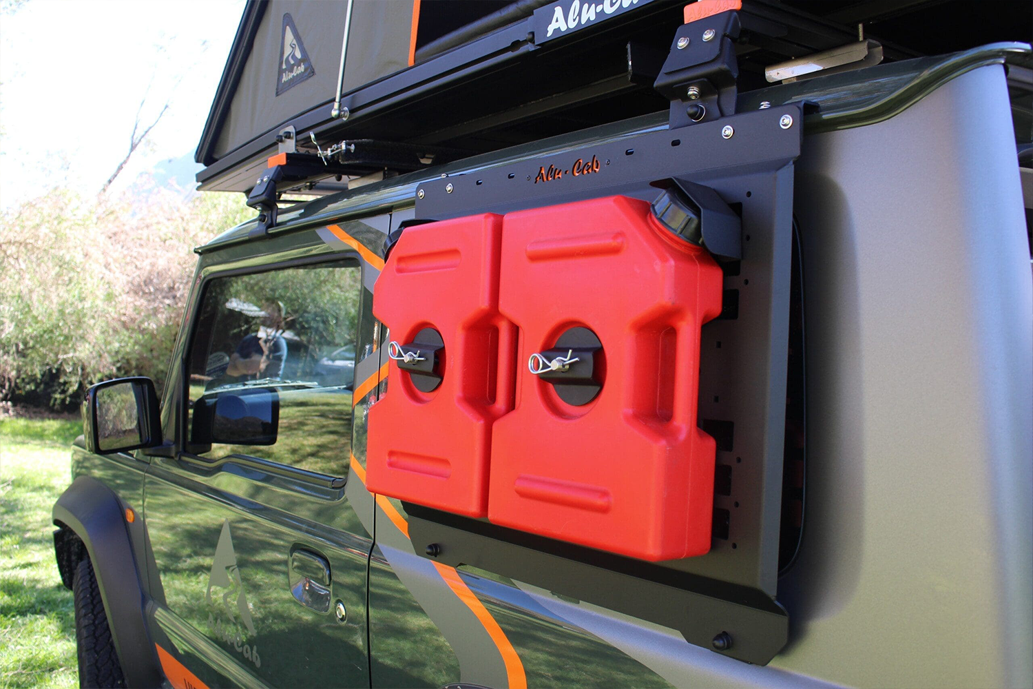 Alu-Cab Jimny Jerry Can Mount fitted to Suzuki Jimny — Rival 4x4 Australia