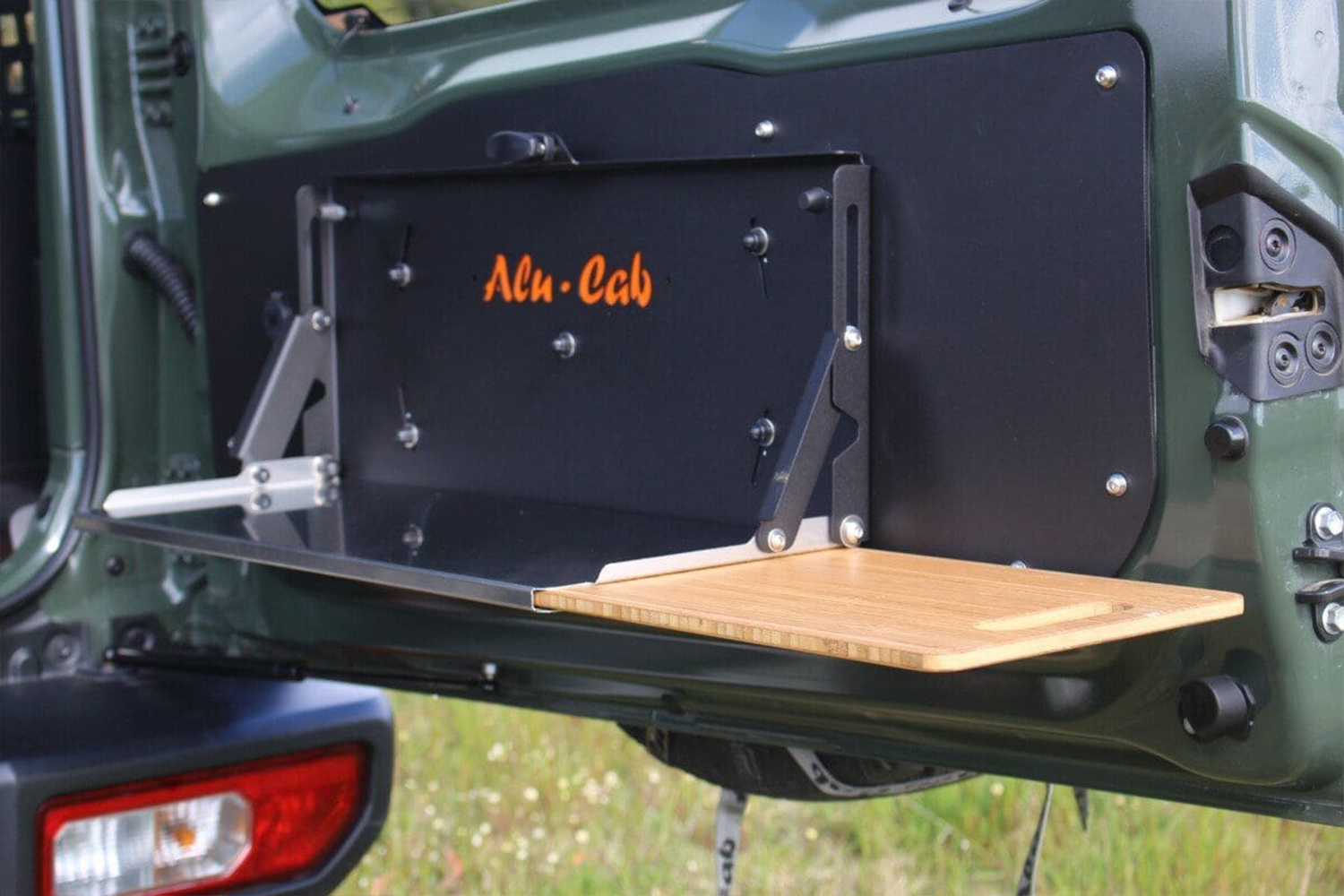Alu-Cab Jimny Rear Door Drop Down Table fitted to Suzuki Jimny — Rival 4x4 Australia